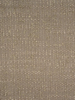 A close-up of a textured fabric or wallpaper material in a warm taupe-beige color with a subtle dotted pattern.