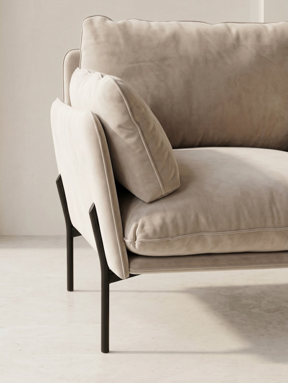 Beige sofa with black legs in a minimalistic room