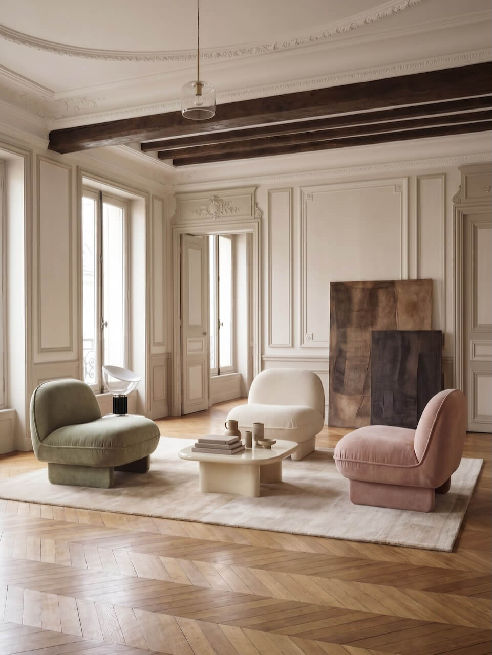 Modern living room with stylish furniture and decorative elements.